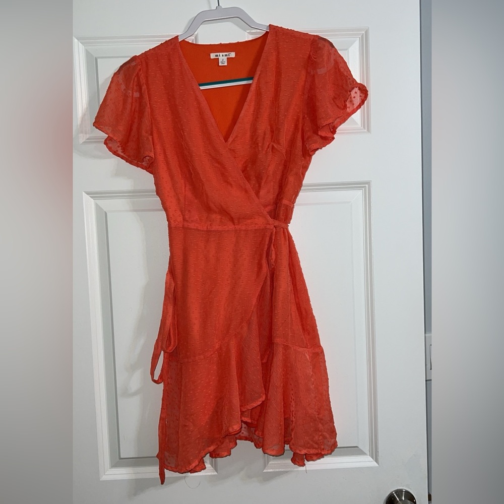 Francesca’s Miami coral flowy dress